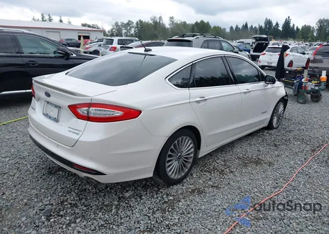 2014 Ford Fusion Hybrid Titanium из США, поврежденный, VIN 3FA6P0RUXER292751